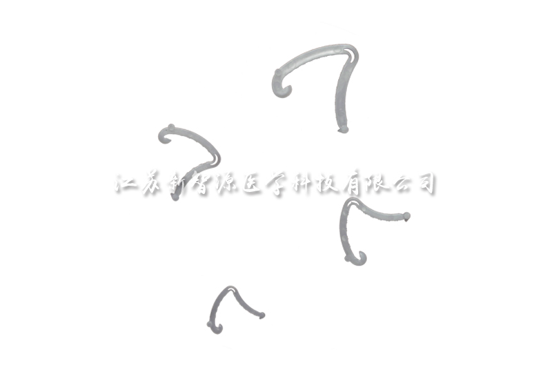 Implantable ligating clip